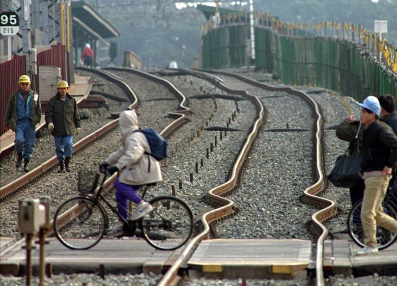 Railroad tracks in Nishinomiya, near Kobe in western Japan, were buckled by the 1995 earthquake that hit the region. (Itsuo Inouye / The Associated Press, 1995) 