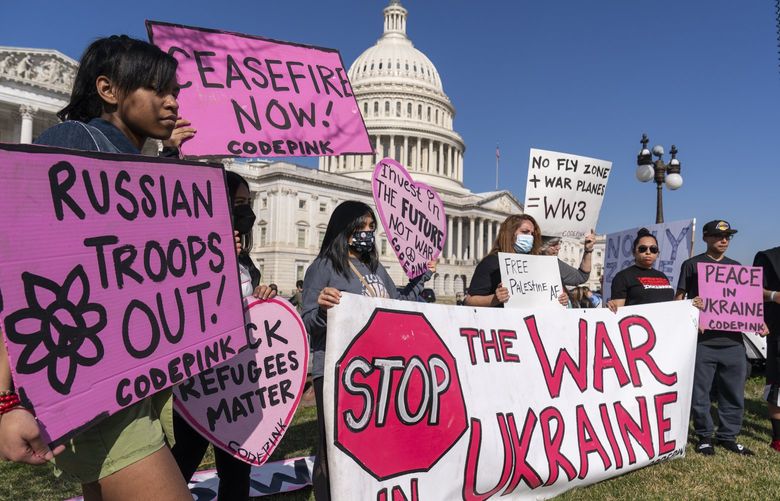 Activists protest the Russia Ukraine war on the East Front of the U.S. Capitol, in Washington, Wednesday, March 16, 2022. (AP Photo/Alex Brandon) DCAB121