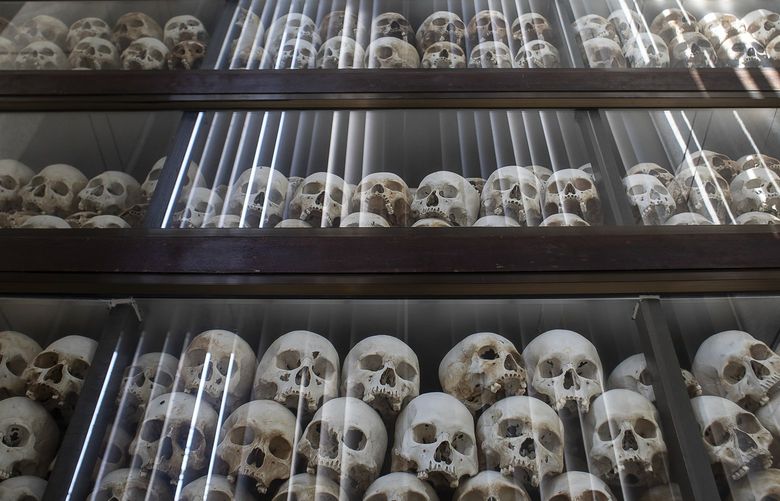Skulls of Khmer Rouge victims in a memorial at the Choeung Ek Museum in Phnom Penh, Cambodia, on Saturday, Jan. 22, 2022. The museum is a mass gravesite where almost 9,000 bodies were discovered. Up to a quarter of Cambodia’s population died in the brutal Khmer Rouge years, 1975 to 1979. (Nadia Shira Cohen/The New York Times) XNYT63