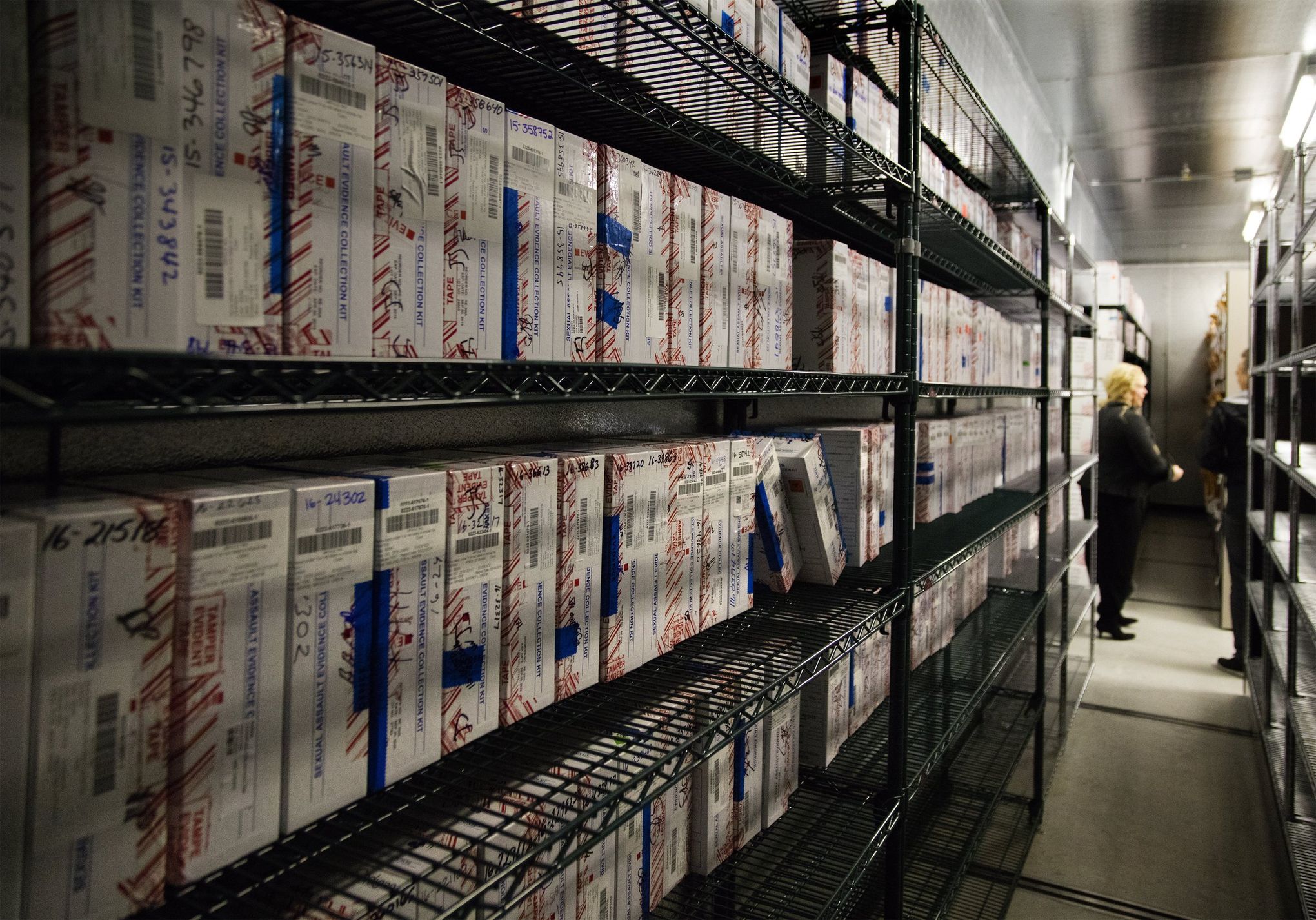 Hundreds of untested rape kits fill a freezer isle in the Seattle Police Departments evidence room