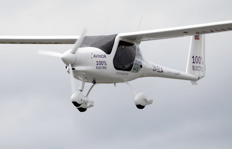 FILE – A Slovenian made Pipistrel electric plane flies near the Oslo Airport, in Gardermoen, Norway, on June 18, 2018. U.S. industrial conglomerate Textron Inc. has signed a deal to acquire Pipistrel, the Slovenian ultralight aircraft maker and pioneer in electrically powered aviation. (Gorm Kallestad/NTB scanpix via AP, File) XDB101 XDB101