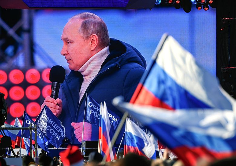 Putin appears at big rally as troops press attack in Ukraine