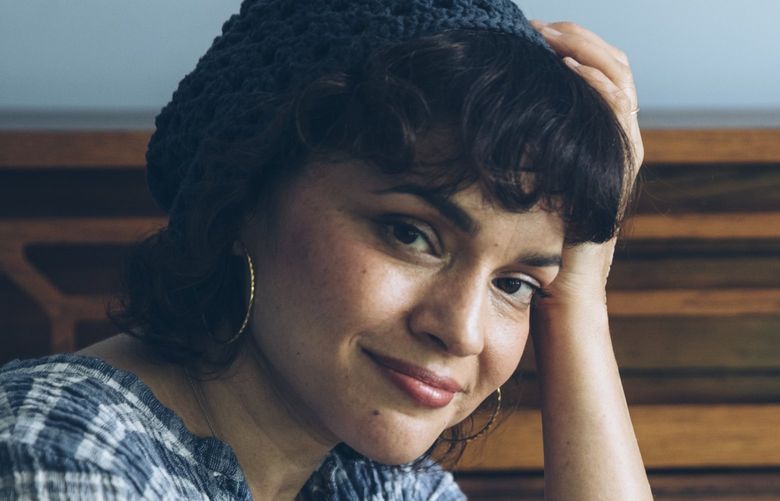 In this June 8, 2020 photo, singer-songwriter Norah Jones poses for a portrait in upstate New York to promote her latest album “Pick Me Up Off the Floor.”