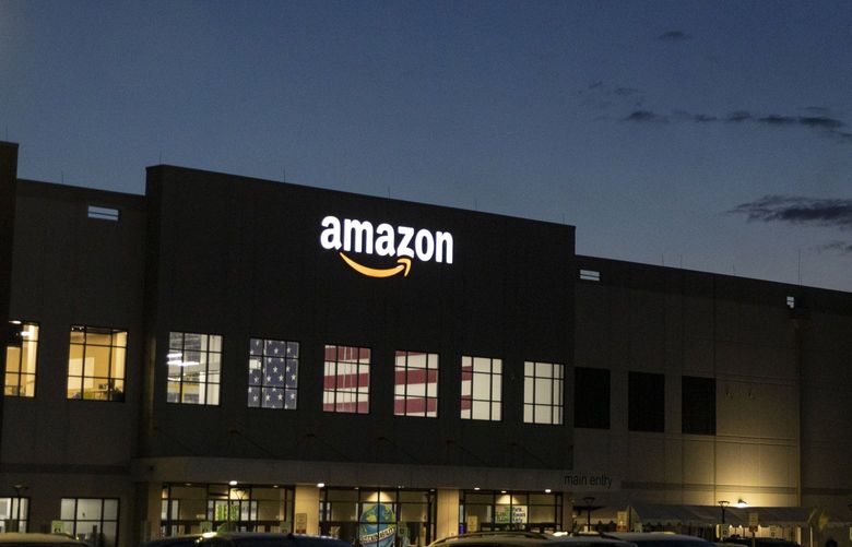 FILE – An Amazon distribution center on Staten Island in New York on May 13, 2021. Amazon has eclipsed Walmart to become the world’s largest retail seller outside China, according to corporate and industry data. (Dave Sanders/The New York Times)