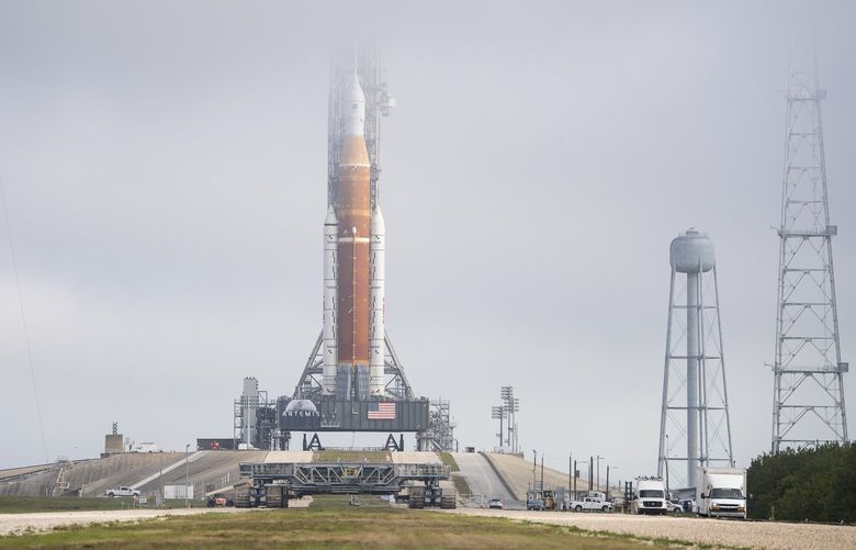This photo from NASA shows the Space Launch System rocket at Launch Complex 39B of the Kennedy Space Center in Cape Canaveral, Fla., on Friday, March 18, 2022. NASA plans to give SpaceX some company on the moon. (Aubrey Gemignani/NASA via The New York Times) – EDITORIAL USE ONLY- XNYT236 XNYT236