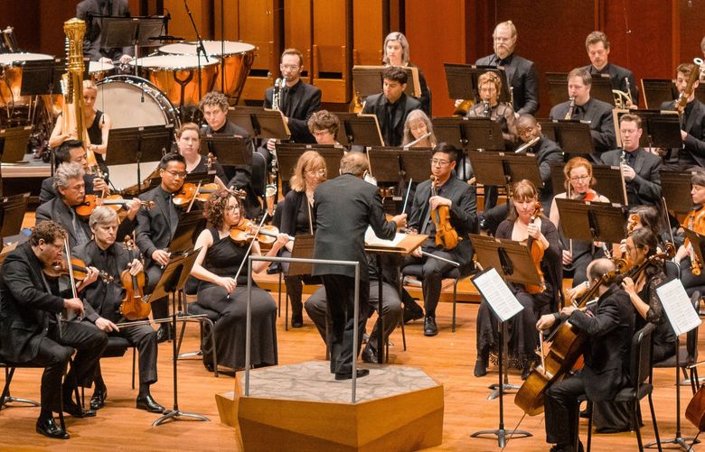 Conductor Emeritus Ludovic Morlot conducts the Seattle Symphony at Benaroya Hall in June 2019. Morlot will conduct the orchestra at the benefit concert for Ukraine on April 4, where all musicians and performers are donating their time.