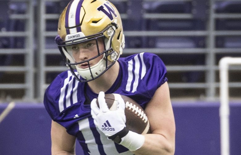 Wed. March 30, 2022.  First UW football spring practice.   UW running back Camden Sirmon working out during the first day of spring football practice.   219945