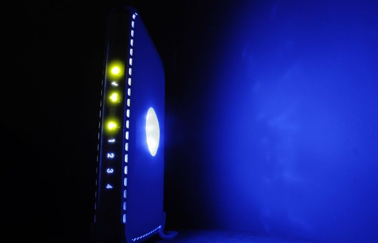 Displayed is a LED-illuminated wireless router in Philadelphia, Sunday, July 27, 2008.  (AP Photo/Matt Rourke) wi-fi