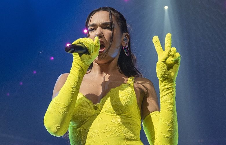Dua Lipa performs at the United Center on Wednesday, March 9, 2022, in Chicago. (Photo by Rob Grabowski/Invision/AP)