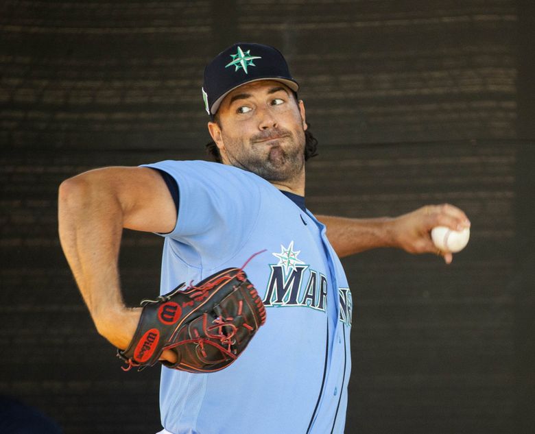 Seattle Mariners starting pitcher Robbie Ray begins his windup