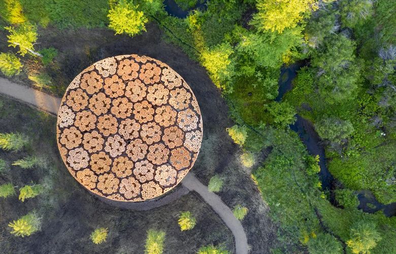  In a photo provided by Iwan Baan shows an aerial view of Xylem pavilion. Using indigenous materials and local symbols, Kéré makes buildings that serve the community he came from. (Iwan Baan via The New York Times)