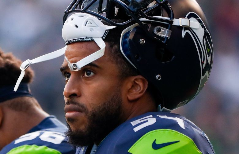 Lumen Field – Seattle Seahawks vs. Arizona Cardinals – 112121

Seattle Seahawks linebacker Bobby Wagner and linebacker Jordyn Brooks stand for the national anthem before the start of a game Sunday, Nov. 21, 2021, in Seattle. 218880