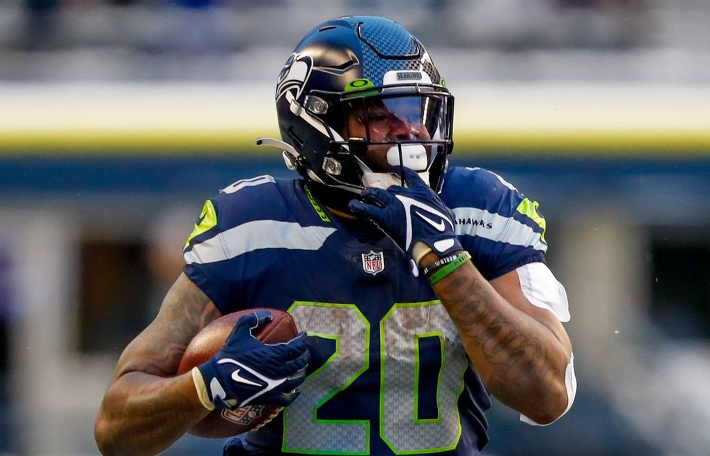 Seattle Seahawks running back Rashaad Penny (20) runs from Arizona  Cardinals inside linebacker Zaven Collins (25) during an NFL Professional  Football Game Sunday, Jan. 9, 2022, in Phoenix. (AP Photo/John McCoy Stock  Photo - Alamy