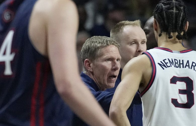 Gonzaga head coach Mark Few speaks with his players during the second half of an NCAA college basketball championship game against Saint Mary’s at the West Coast Conference tournament Tuesday, March 8, 2022, in Las Vegas. (AP Photo/John Locher)
