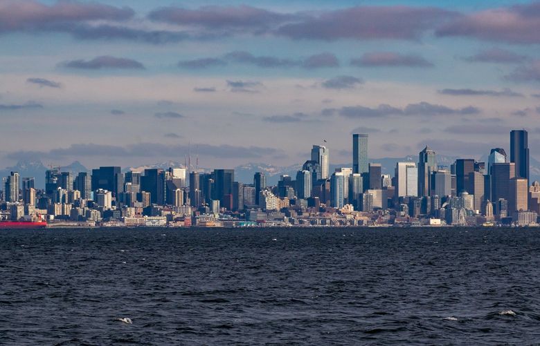 On the Bainbridge to Seattle Washington State Ferry – Port of Seattle and downtown – 021122

The Cascade Mountains provide a backdrop to the skyline of downtown Friday, Feb. 11, 2022 in Seattle, Wash. 219599