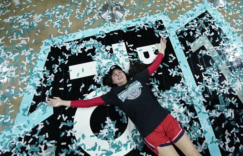 Gonzaga’s Melody Kempton celebrates after her team defeated BYU in an NCAA women’s championship college basketball game at the West Coast Conference tournament Tuesday, March 8, 2022, in Las Vegas. (AP Photo/John Locher) NVJL108 NVJL108