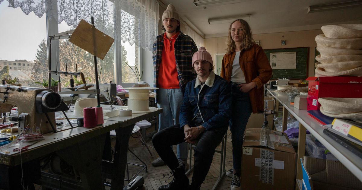 Ukrainian fashion brand in bombarded city picks up and flees