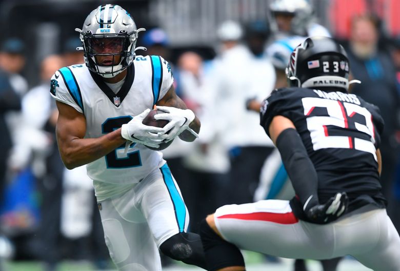 Busy Panthers extend WR D.J. Moore, add 4 free agents