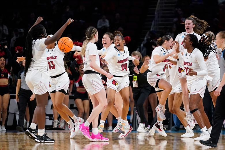 Louisville beats Michigan 62-50 to return to Final Four