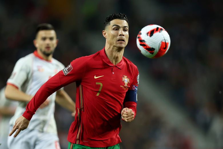 Portugal tops N. Macedonia, Ronaldo makes it to another WCup | The Seattle  Times