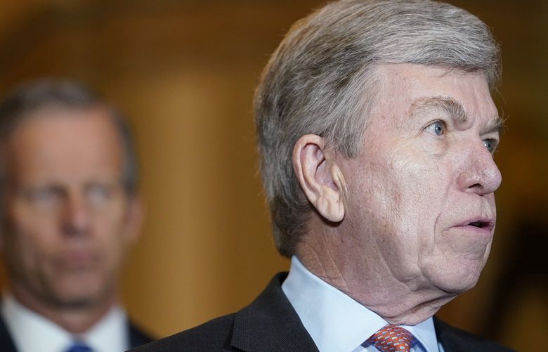 Sen. Roy Blunt, R-Mo., right, speaks to reporters after a Republican strategy meeting at the Capitol in Washington, Tuesday, March 15, 2022. (AP Photo/Mariam Zuhaib) DCMZ212 DCMZ212