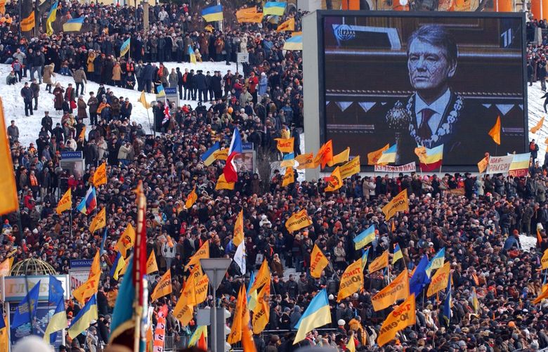 FILE â€” Supporters of the president of Ukraine, Viktor Yushchenko, at his swearing-in in Kiev on Jan. 23, 2005.  The 2004 Orange Revolution in Ukraine ousted the Kremlinâ€™s handpicked candidate and culminated in the election of Viktor Yushchenko in 2005. (James Hill/The New York Times) â€”NO SALES â€” XNYT24 XNYT24