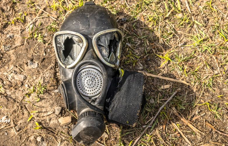 A smashed Russian respirator lies discarded on the ground in Bucha, a suburb of Kyiv, Ukraine, on Monday, April 4, 2022. The number of Russian troop losses in the war so far remains unknown, though Western intelligence agencies estimate 7,000 to 10,000 killed. (Daniel Berehulak/The New York Times) XNYT185