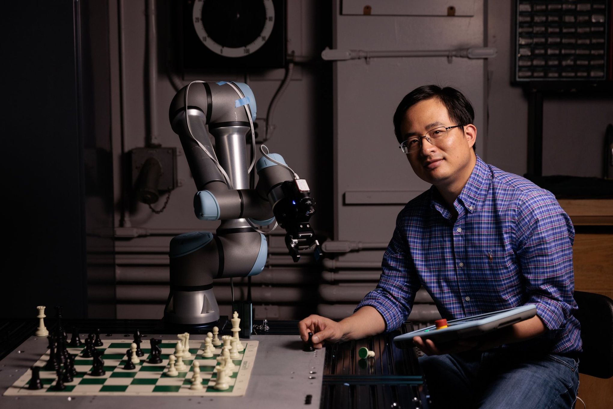 Chessboard with miniature buildings representing  and microsoft