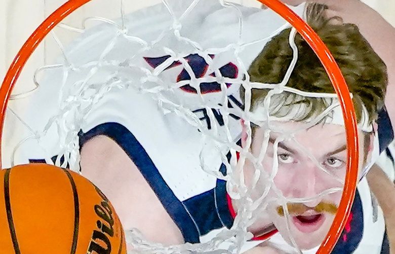 Gonzaga forward Drew Timme watches his shot against Arkansas during the first half of a college basketball game in the Sweet 16 round of the NCAA tournament in San Francisco, Thursday, March 24, 2022. (AP Photo/Marcio Jose Sanchez) CAJC134