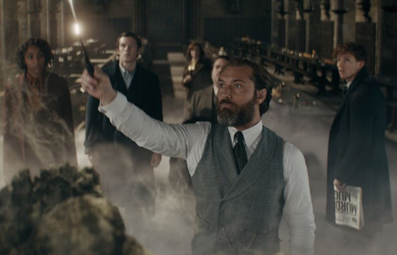 “Fantastic Beasts: The Secrets of Dumbledore” includes, from left, Jessica Williams as Eulalie “Lally” Hicks, Callum Turner as Theseus Scamander, Fiona Glascott as Minerva McGonagall, Dan Fogler as Jacob Kowalski, Jude Law as Albus Dumbledore and Eddie Redmayne as Newt Scamander.