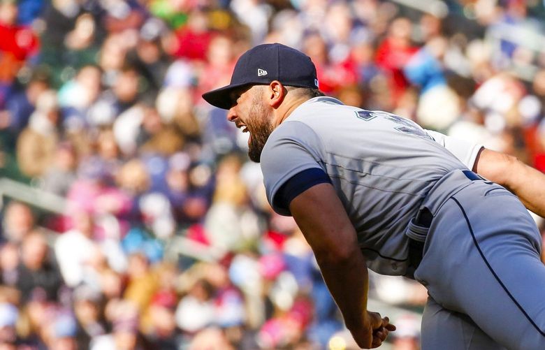 Seattle Mariners starting pitcher Robbie Ray shouts as he throws against the Minnesota Twins during the fifth inning, Friday, April 8, 2022, in Minneapolis. MNNN114