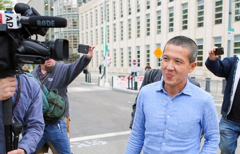 FILE — Roger Ng, a former Goldman Sachs banker, leaves federal district court in the Brooklyn borough of New York, May 6, 2019. Ng was convicted on Friday, April 8, 2022, on bribery and money-laundering charges stemming from a global fraud scandal: the looting of more than $4 billion from a Malaysian sovereign wealth fund. (Jefferson Siegel/The New York Times) XNYTF