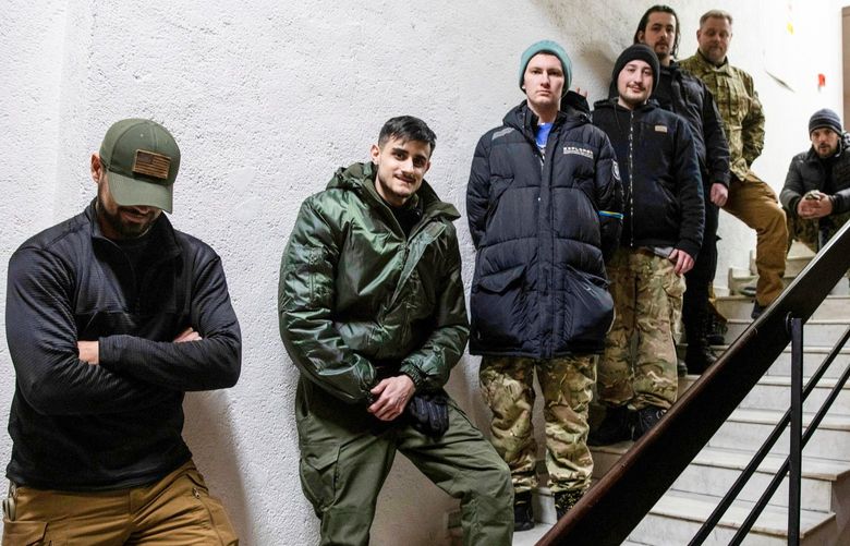 An early group of volunteer fighters gather in Kyiv, including (left to right) Kelso from Montana, Mehmet from Germany, Adam from California, Driven from Washington State, and Nile and Mike from Sweden.