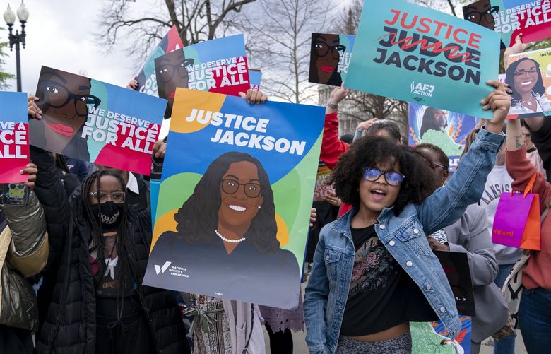 People celebrate the confirmation of Judge Ketanji Brown Jackson, the first Black woman to reach the Supreme Court during a rally outside of the U.S. Supreme Court on Capitol Hill, in Washington, Friday, April 8, 2022. ( AP Photo/Jose Luis Magana) DCJL107 DCJL107