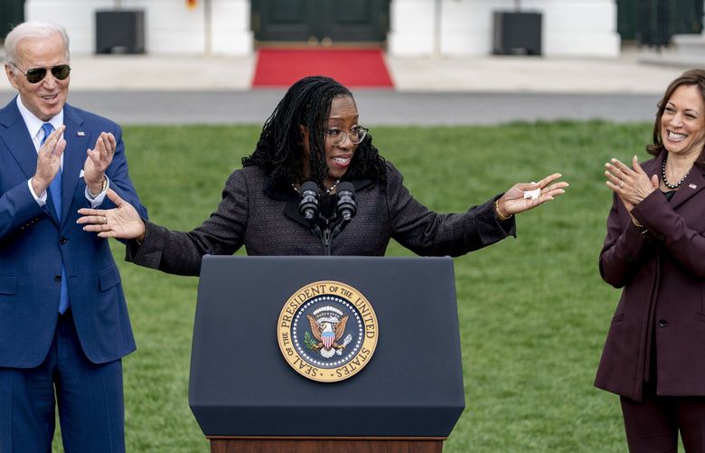 Judge Ketanji Brown Jackson, accompanied by President Joe Biden, and Vice President Kamala Harris, speaks during an event on the South Lawn of the White House in Washington, Friday, April 8, 2022, celebrating the confirmation of Jackson as the first Black woman to reach the Supreme Court. (AP Photo/Andrew Harnik) DCAH116 DCAH116