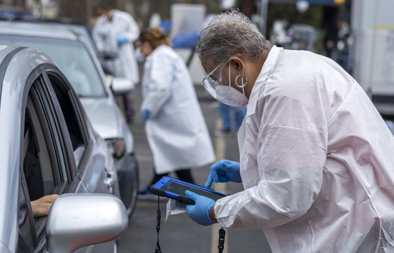 Rev. Felicia Bagneris is testing for COVID-19 at the historic First African Methodist Episcopal Church (FAME) on Saturday, Jan. 29, 2022, in Los Angeles. (Francine Orr/Los Angeles Times/TNS) 44666910W 44666910W