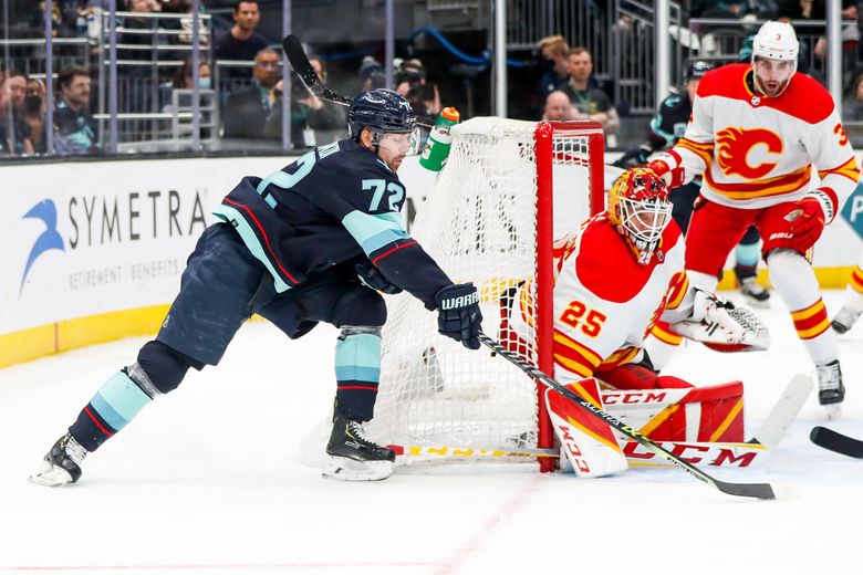 Kraken score 3 goals in 3rd period for 1st win over Flames