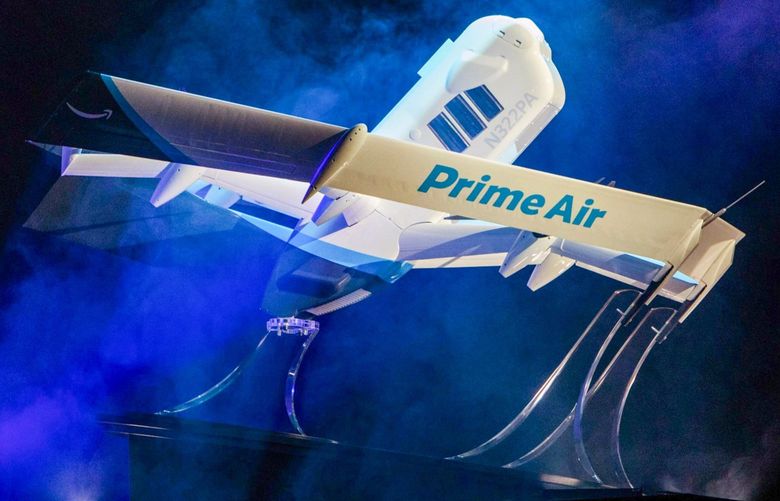 Amazon.com Inc. Prime Air delivery drone is unveiled during a reveal event in Las Vegas, Nevada, U.S., on Wednesday, June 5, 2019. Amazon.com Inc. has unveiled a revolutionary new drone — part helicopter and part science-fiction aircraft — that the company expects to use for test deliveries of toothpaste and other household goods starting within months. 775352215