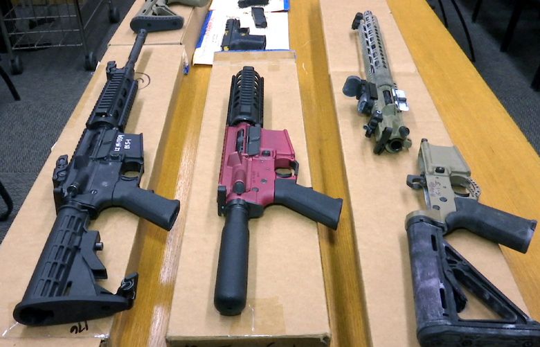 FILE – “Ghost guns” are displayed at the headquarters of the San Francisco Police Department in San Francisco, on Nov. 27, 2019.  The Biden administration is unveiling a completed rule aimed at reining in the proliferation of ghost guns, firearms without serial numbers that have been turning up at crime scenes across the nation in increasing numbers. The White House and the Justice Department argue that regulating the firearms parts and requiring dealers to stamp serial numbers of ghost guns will help drive down violent crime and aid investigators in solving crimes. Gun groups, however, argue that the government is overreaching and that its rule violates federal law.  (AP Photo/Haven Daley, File) WX102 WX102