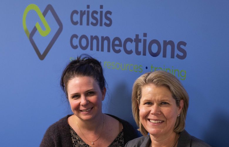 Nicole Clemmons, left, and Michelle McDaniel run Crisis Connections, which will soon take on 988 mental health calls.  

Friday, April 8, 2022. 220004