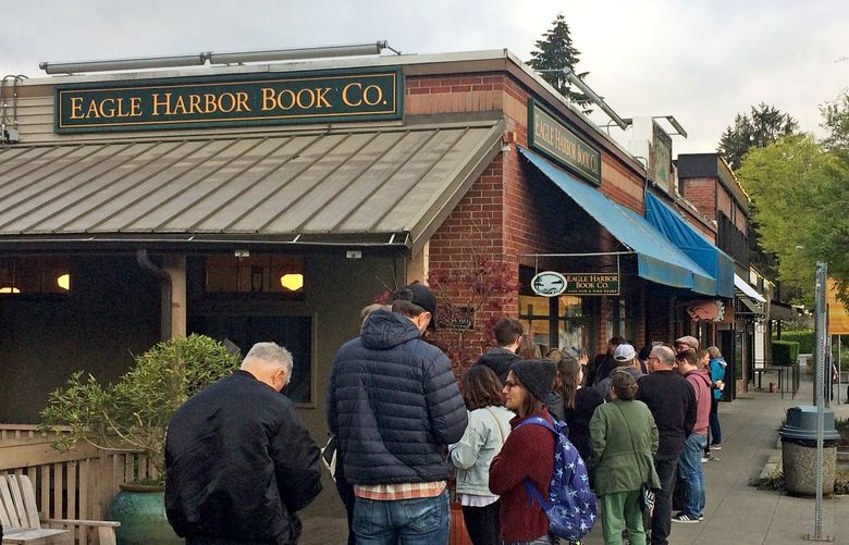 Eager book-lovers line up outside Eagle Harbor Book Co. on Bainbridge Island on Seattle Independent Bookstore Day in 2019.