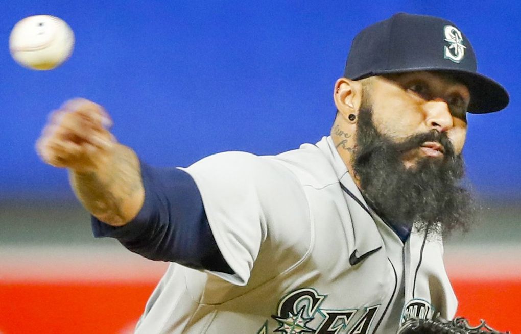 Mariners place pitcher Sergio Romo on 10-day injured list, add Matt Koch to  the roster