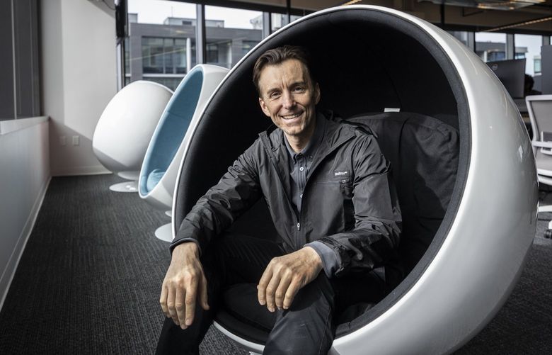 Thursday, March 24, 2022. Qualtrics CEO Zig Serafin cooling it in a pod facing the view on the 18th floor of their co-headquarters in downtown Seattle.   219889