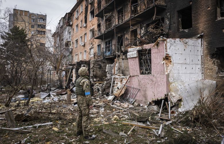 FILE — An apartment building that was destroyed by Russian missiles in the first days of the invasion in Vasylkiv, Ukraine, March 30, 2022. The director of the CIA. said on April 14 that Vladimir V. Putin’s “potential desperation” to extract the semblance of a victory in Ukraine could tempt him to order the use of a tactical or low-yield nuclear weapon. (Ivor Prickett/The New York Times)  XNYT186 XNYT186