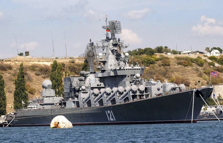 FILE – The Russian missile cruiser Moskva, the flagship of Russia’s Black Sea Fleet is seen anchored in the Black Sea port of Sevastopol, on Sept. 11, 2008. The Russian Defense Ministry confirmed the ship was damaged Wednesday, April 13, 2022, but not that it was hit by Ukraine. The Ministry says ammunition on board detonated as a result of a fire whose causes “were being established,” and the Moskva’s entire crew was evacuated.(AP Photo, File) CHE101 CHE101