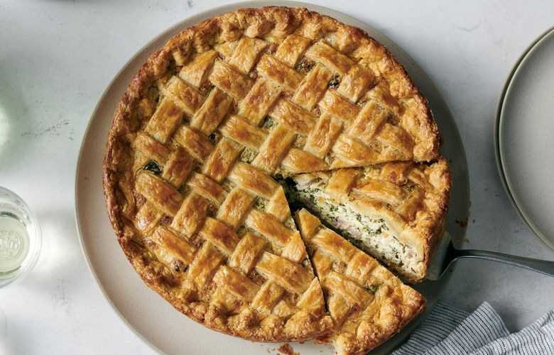 Torta rustica with ricotta and spinach in New York, March 30, 2022. The ham is optional in this filling pie, though you could swap in chopped olives or sundried tomatoes for savoriness. Food styled by Simon Andrews. (David Malosh/The New York Times) XNYT97 XNYT97