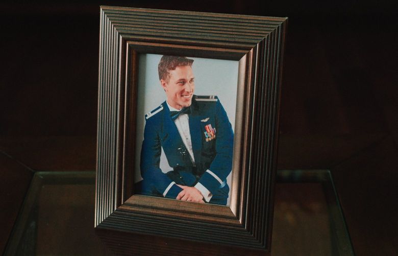A photo of the late Air Force Capt. Kevin Larson, at his parents’ home in Yakima, Wash., March 25, 2022. The drone crews who now kill more people than nearly anyone else in the military are still not counted as combat troops. As the job weighed on Larson and untold others, the Pentagon failed to recognize its full impact. (Mason Trinca/The New York Times)