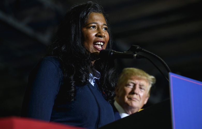 FILE — Kristina Karamo, a candidate for Michigan Secretary of State, speaks at a campaign-style rally for former President Donald Trump in Washington, Mich., on April 2, 2022. Trump is trying to reshape the battleground state in his image, but his false claims about the 2020 election are driving a wedge between loyalists and those who are eager to move on. (Brittany Greeson/The New York Times)