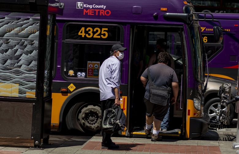 SEATTLE -LO- LINES ONLY-MASK MANDATE – 062421
People board a King County Metro bus on Friday, June 25, 2021. King County’s mask mandate is set to end on June 29.