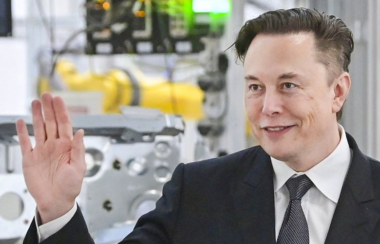 FILE – Tesla CEO Elon Musk attends the opening of the Tesla factory Berlin Brandenburg in Gruenheide, Germany, Tuesday, March 22, 2022. Elon Musk is taking a 9.2% stake in Twitter. Musk purchased approximately 73.5 million shares, according to a regulatory filing. (Patrick Pleul/Pool via AP, File) NY150 NY150